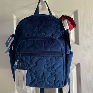 Vera Bradley x Disney Belle backpack and bag charm